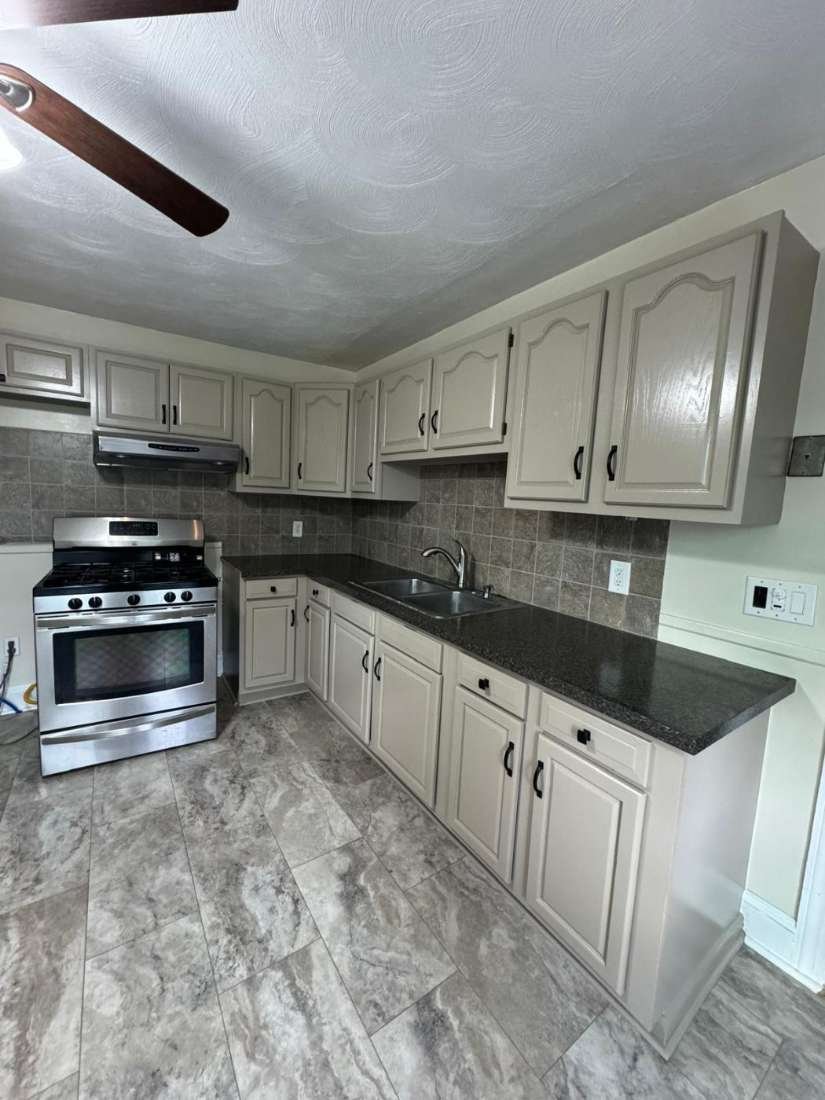 Residential Kitchen · After – Cabinet repainting
