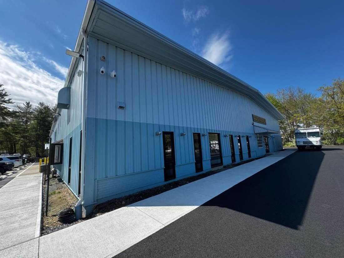 Commercial Warehouse · Rhode Island – Full metal-siding repaint · commercial exterior